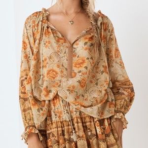 seashell blouse in sand